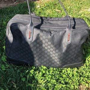 Gucci canvas satchel.